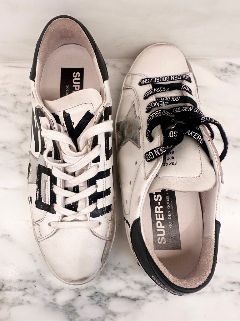 Golden Goose White Leather Low-Top Sneakers With Black Graphic Accents. Love